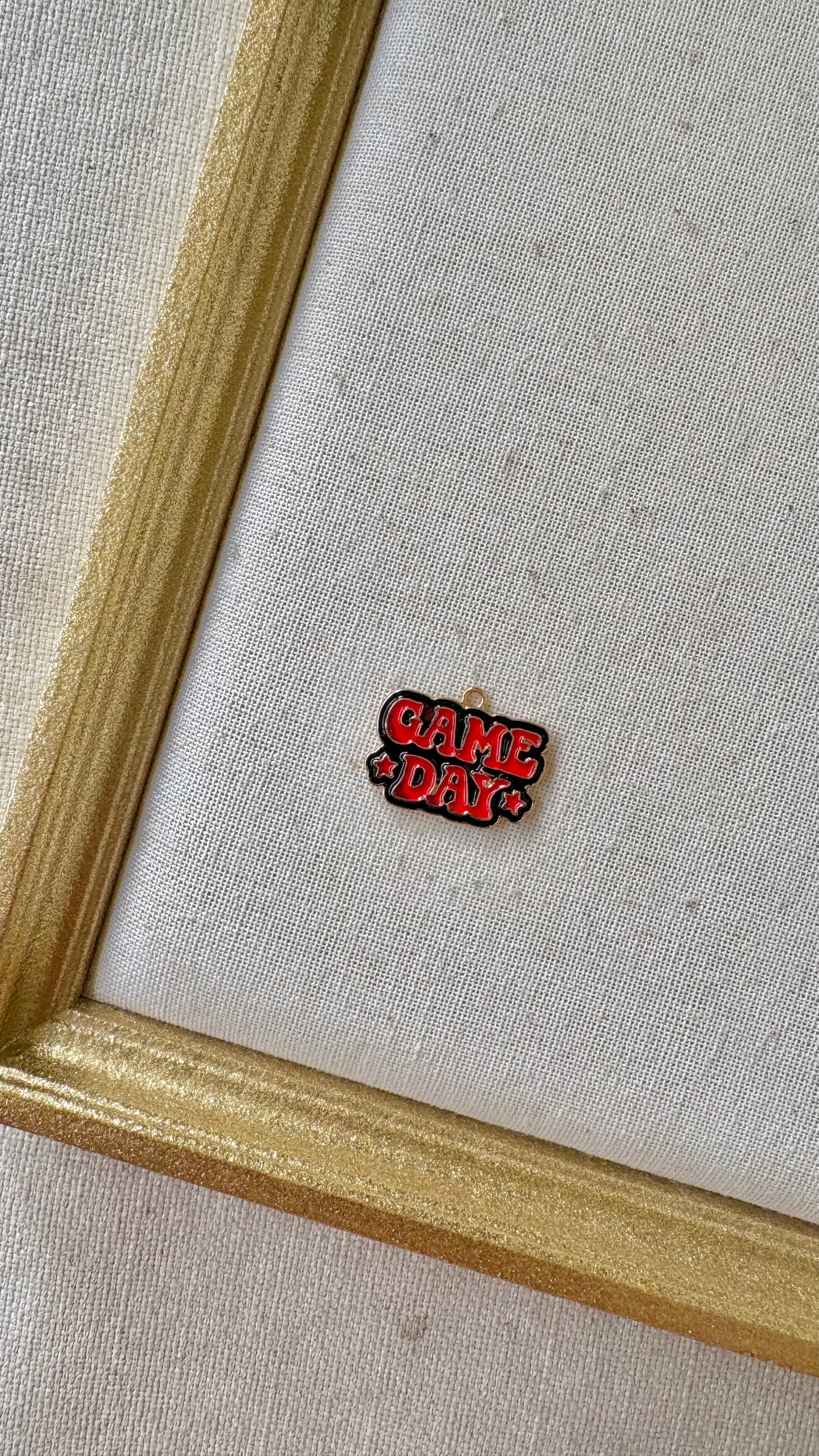 Red and Black Assorted Football Charms