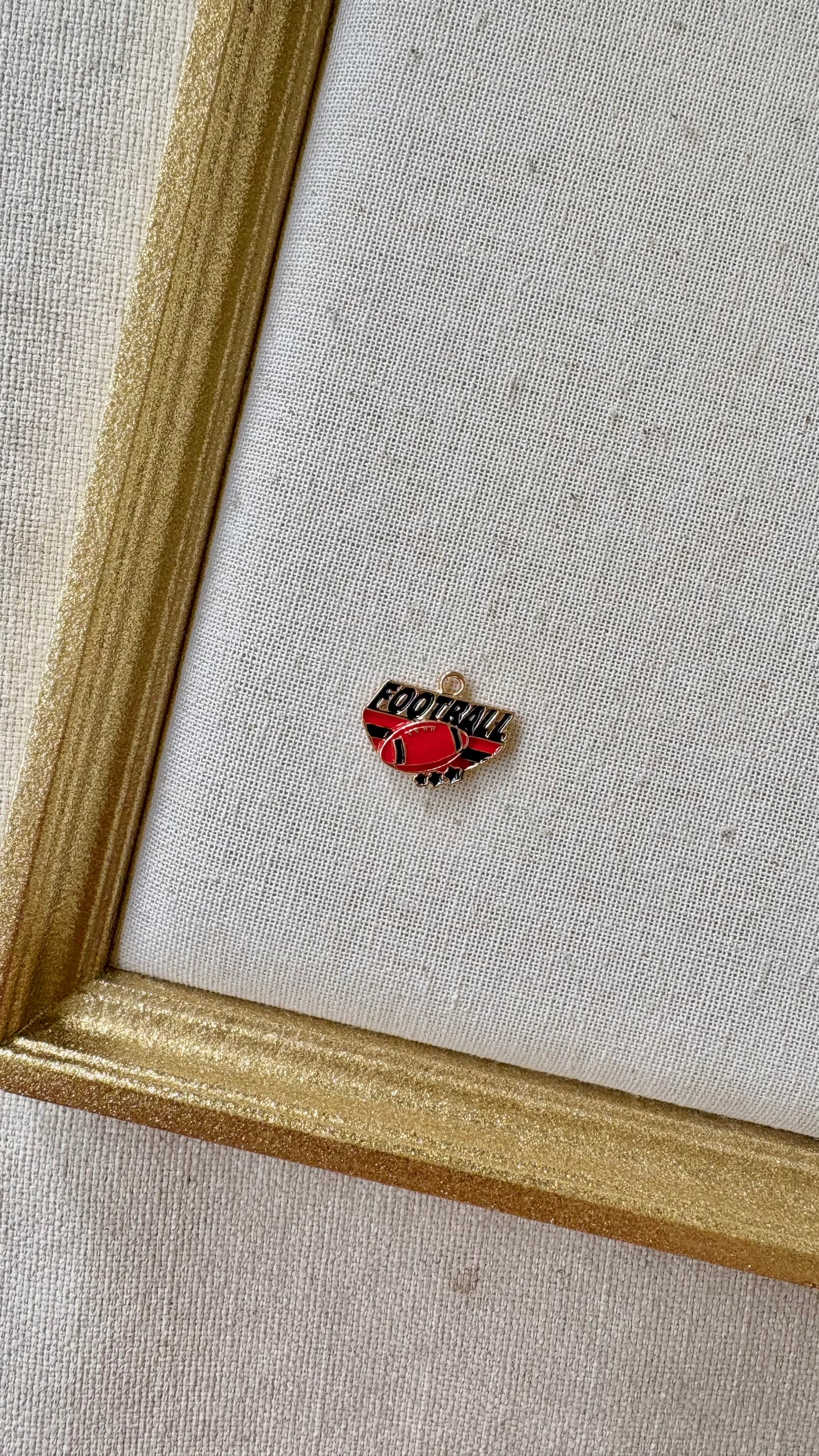 Red and Black Assorted Football Charms