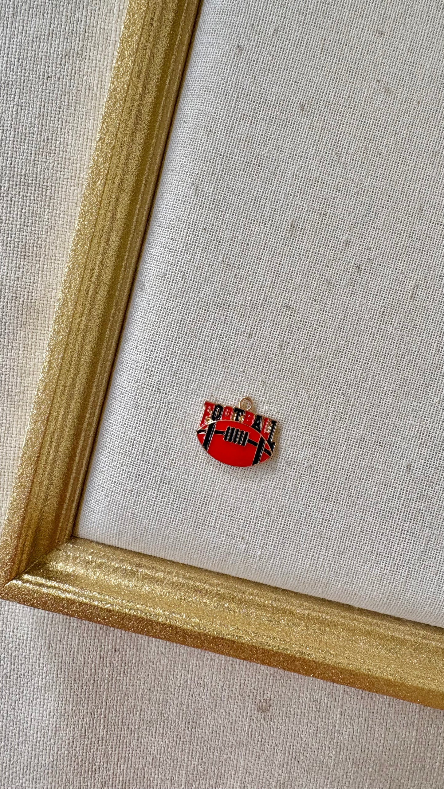 Red and Black Assorted Football Charms