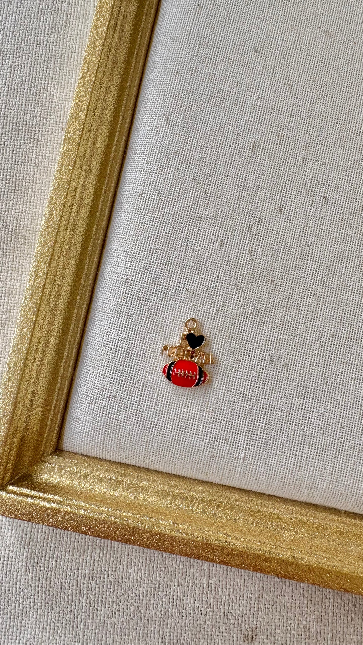 Red and Black Assorted Football Charms