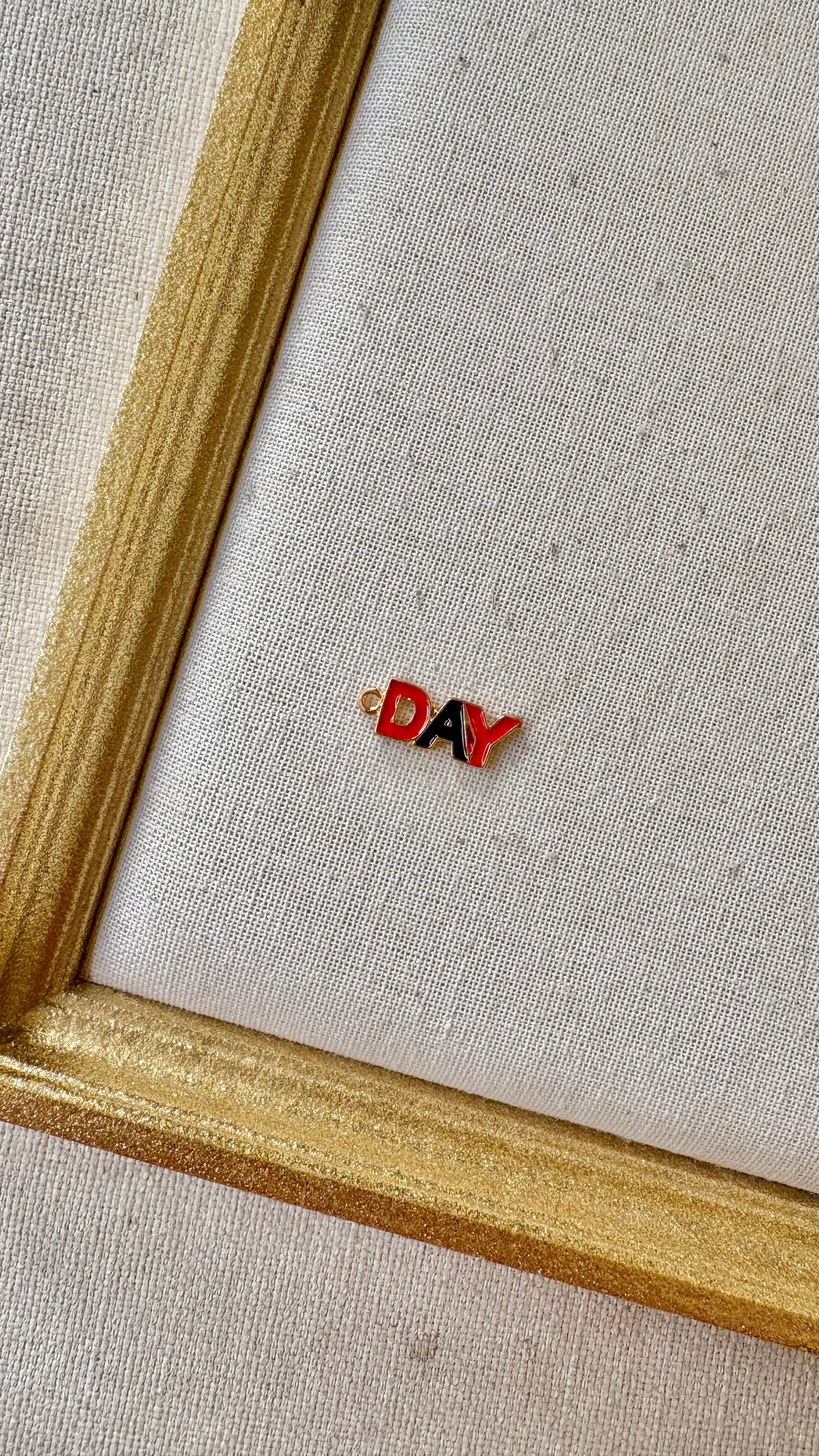 Red and Black Assorted Football Charms
