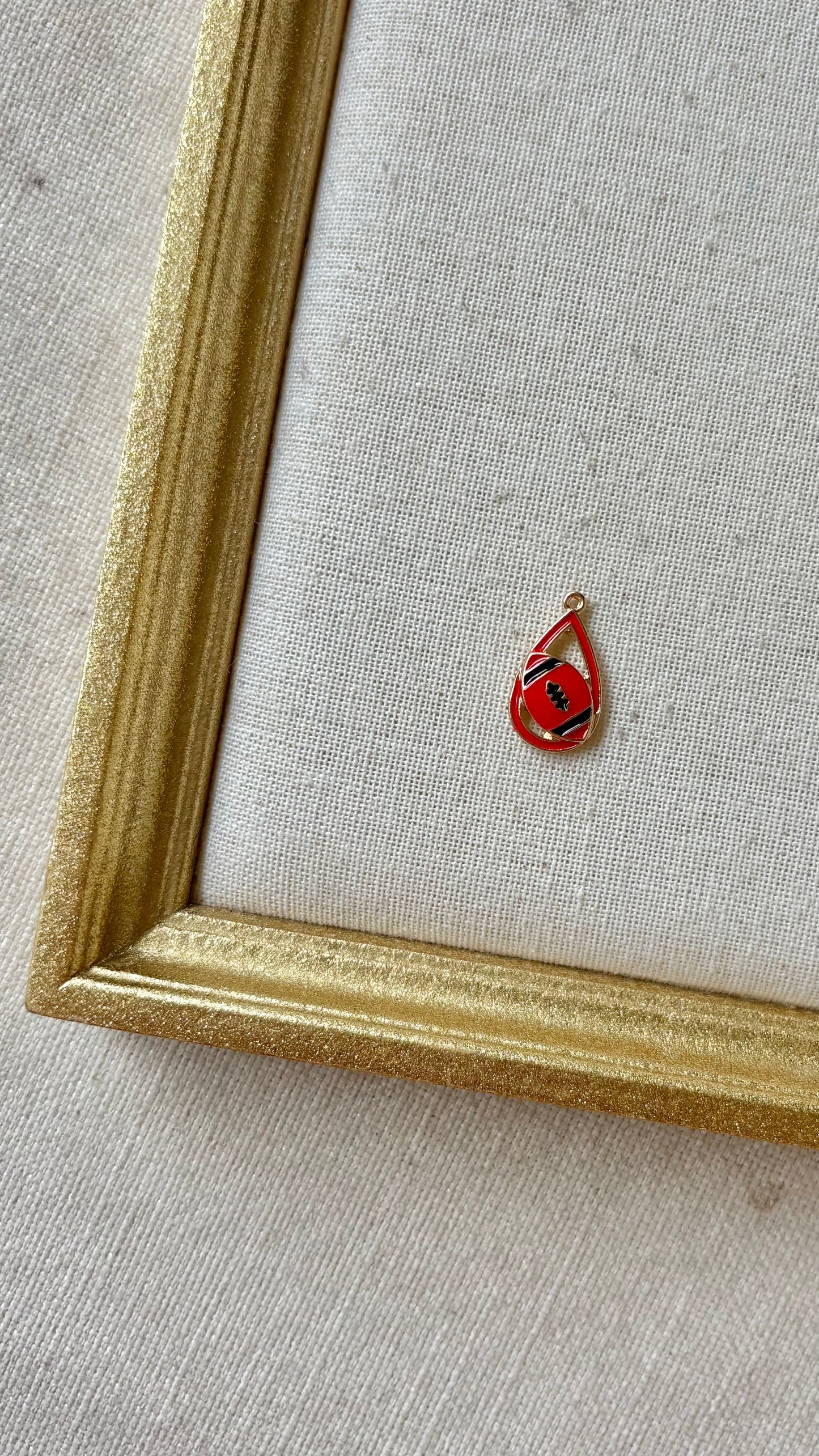Red and Black Assorted Football Charms