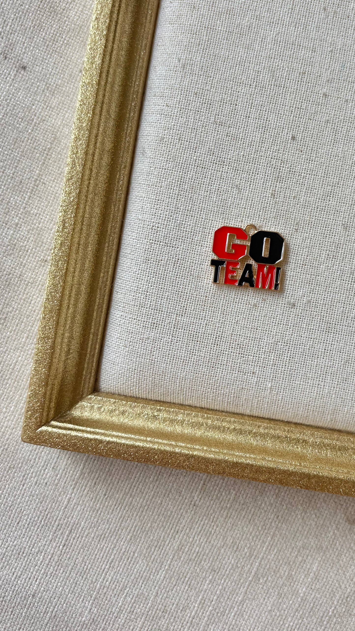 Red and Black Assorted Football Charms