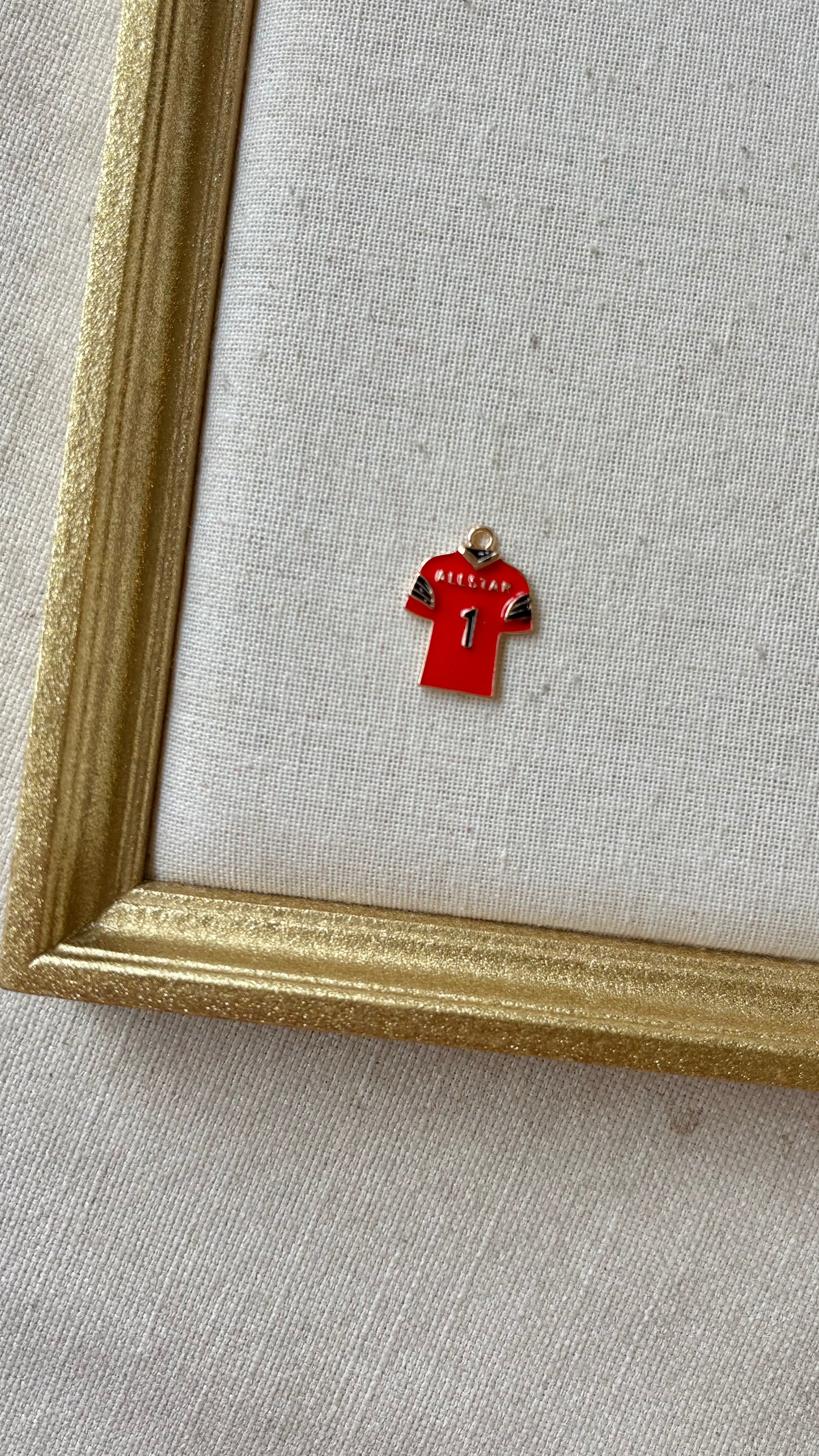 Red and Black Assorted Football Charms