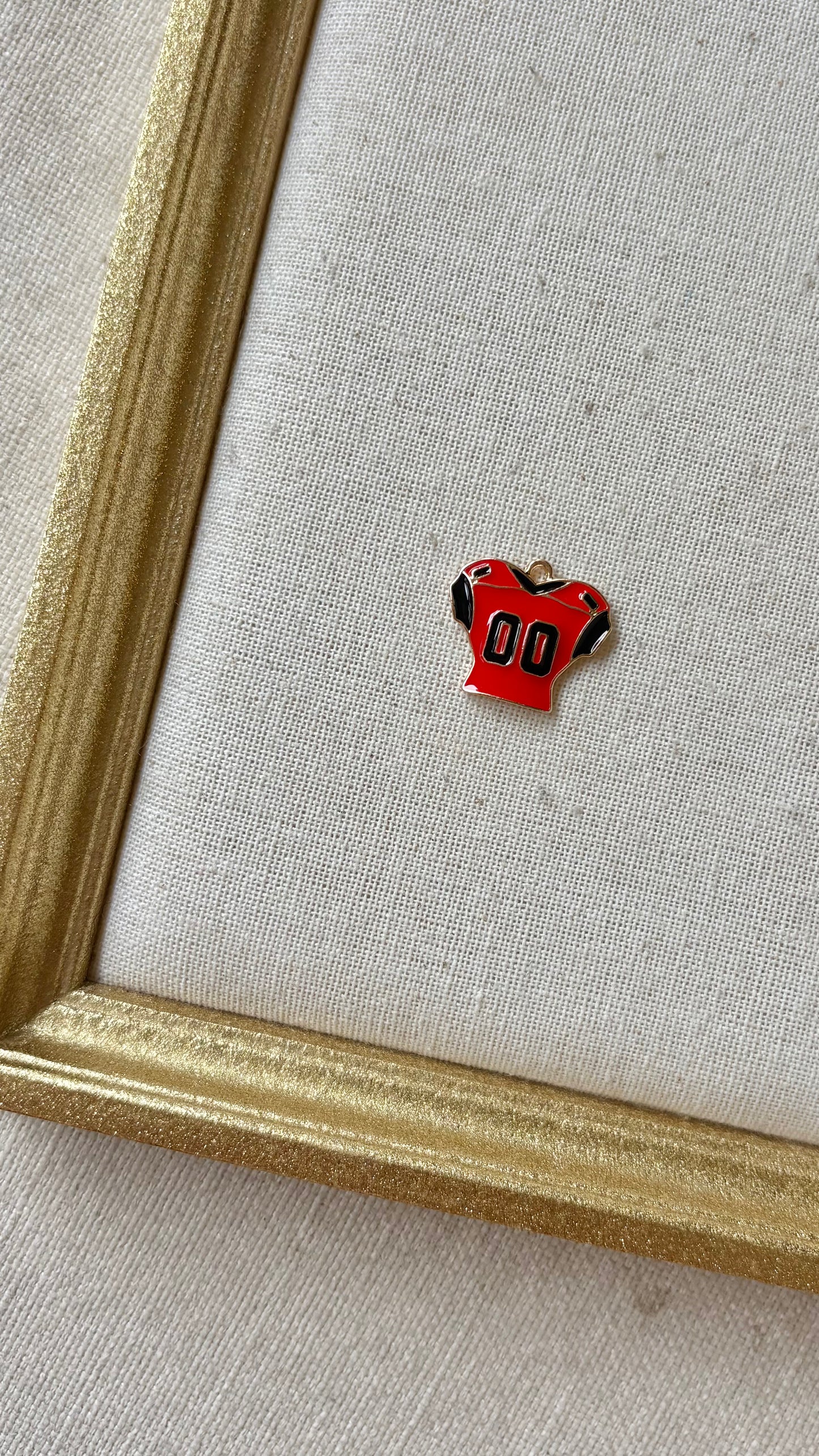 Red and Black Assorted Football Charms