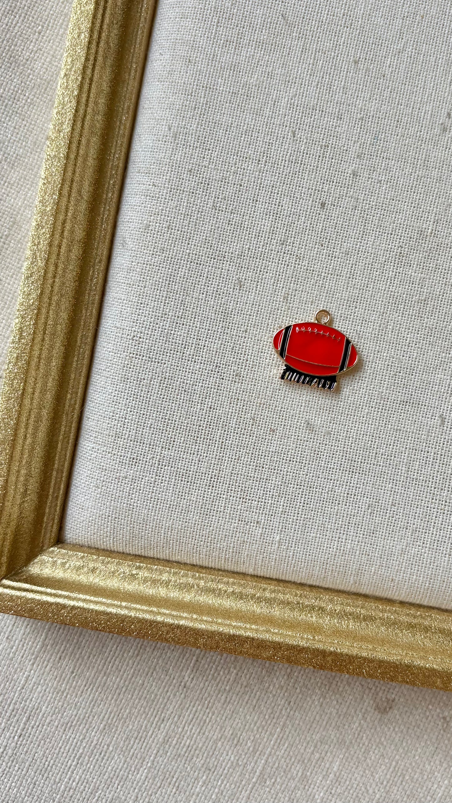 Red and Black Assorted Football Charms
